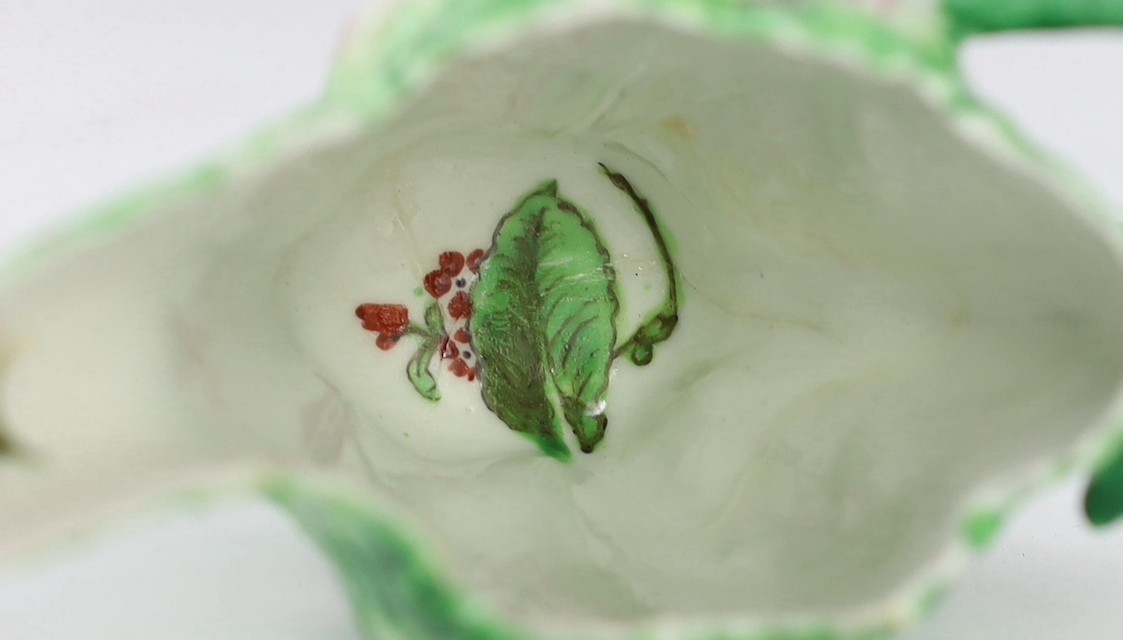 A Longton Hall cream jug, c.1755, 12.5cm long 8.1 cm high, hairline cracks